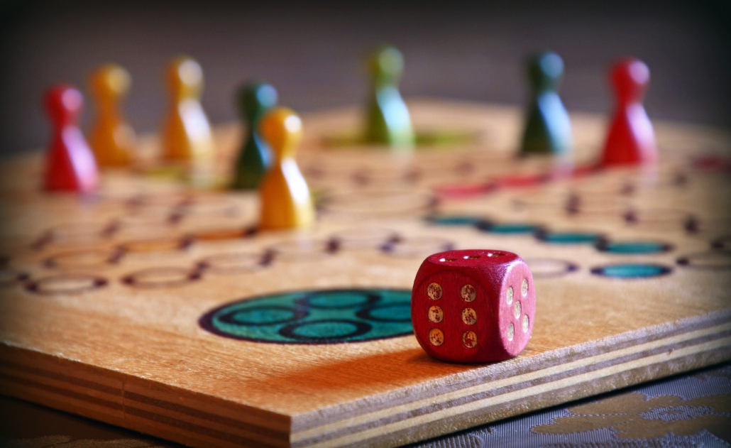 Wooden board game with dice
